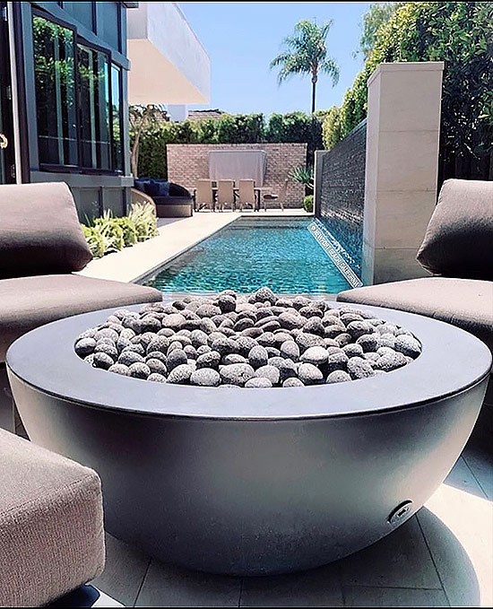 Diamond Fire Glass tumbled lava stones in an outdoor fire pit